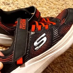 Sketchers black and red shoes